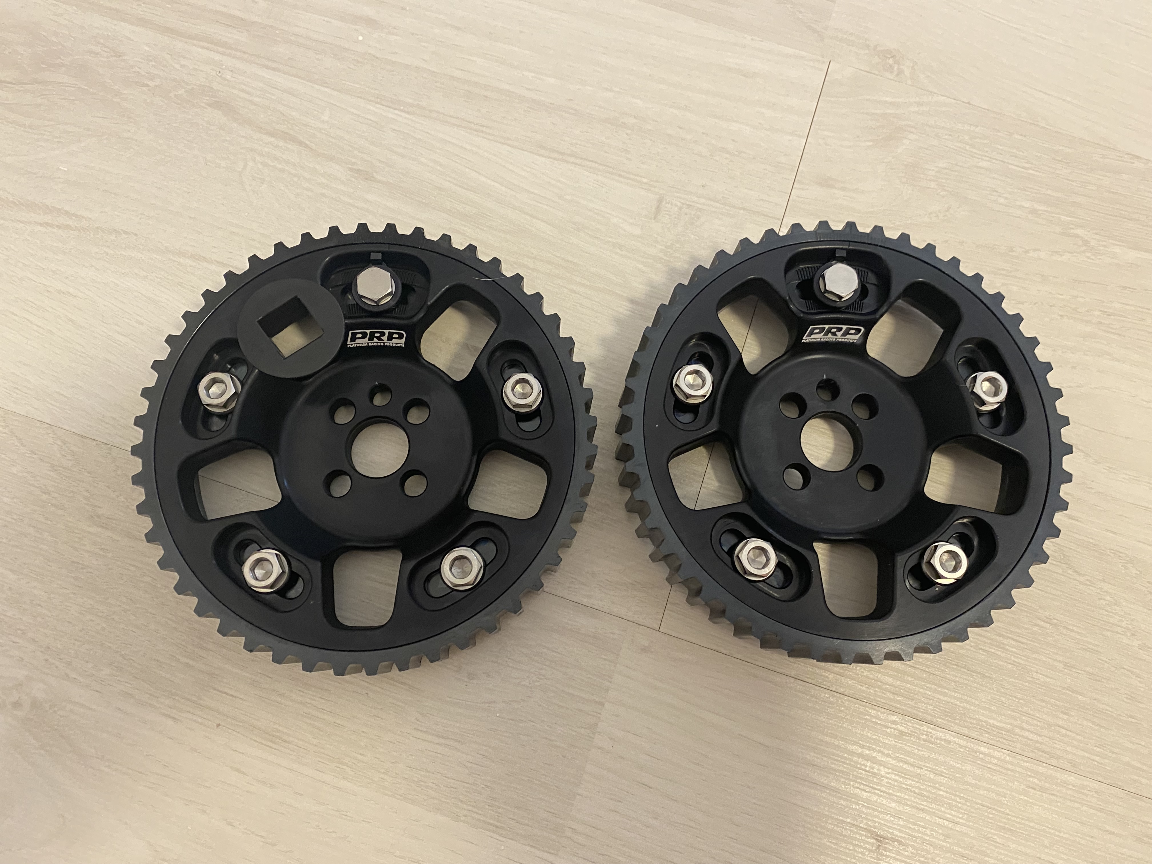 Custom pulleys and adjustable cam gears