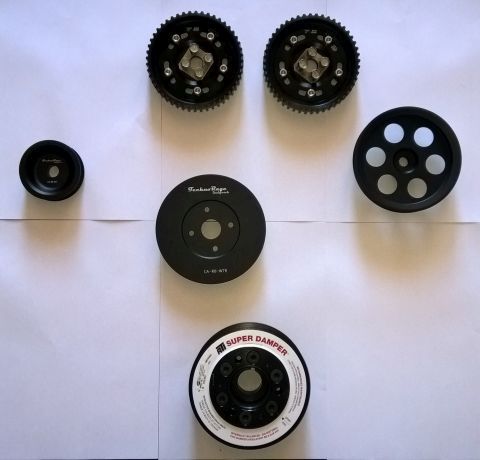 Custom pulleys and adjustable cam gears